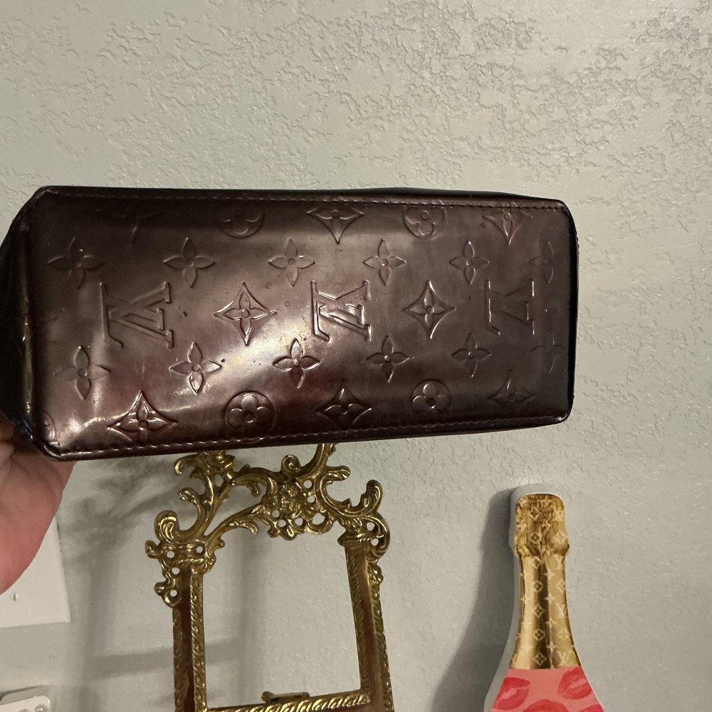 Louis Vuitton  Purple Embossed Mini Bag